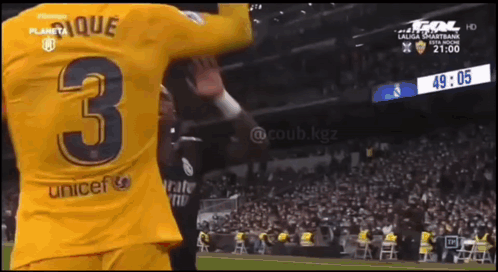 A Soccer Player Wearing A Yellow Shirt With The Number 3 On It GIF