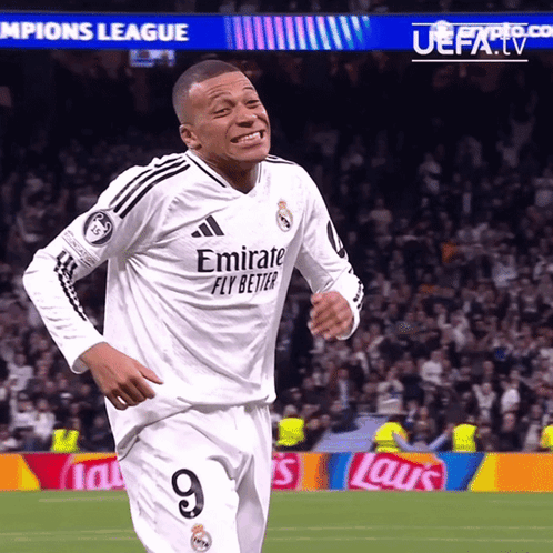 A Soccer Player Wearing An Emirates Fly Better Jersey GIF