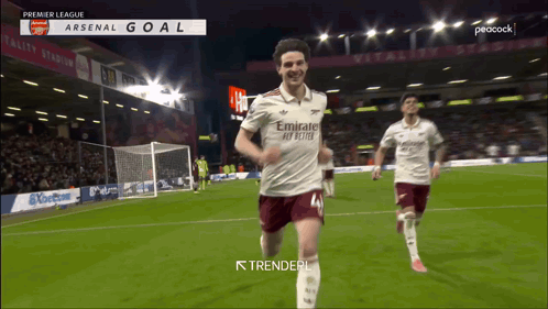A Soccer Player Wearing An Emirates Fly Better Jersey Is Running On A Field GIF