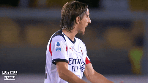 A Soccer Player Wearing An Emirates Fly Shirt GIF