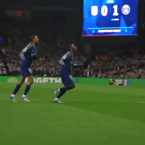 A Soccer Player Wearing Number 25 Is Kneeling On The Field GIF