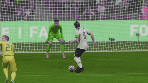 A Soccer Player Wearing Number 9 Kicks The Ball GIF