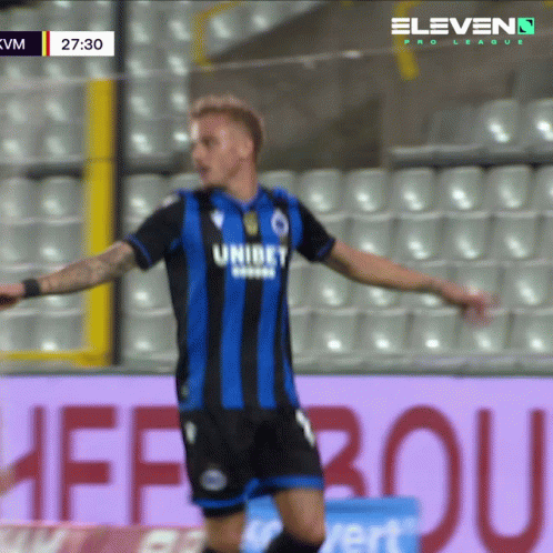 A Soccer Player Wears A Blue And Black Uniform With The Word Unibet On It GIF