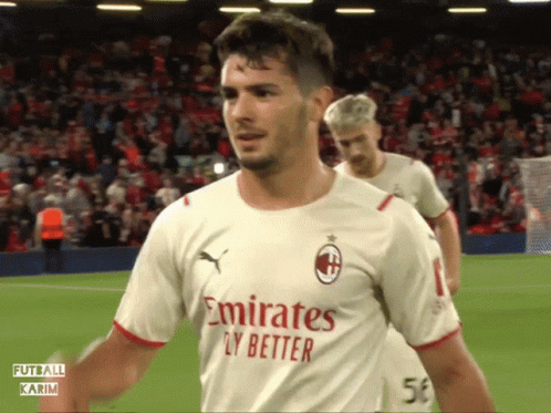 A Soccer Player Wears A White Emirates Fly Better Shirt GIF