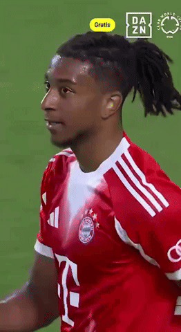 A Soccer Player With Dreadlocks Is Wearing A Red Shirt With The Number 7 On It GIF