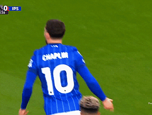 a soccer player with the name chaplin on his jersey