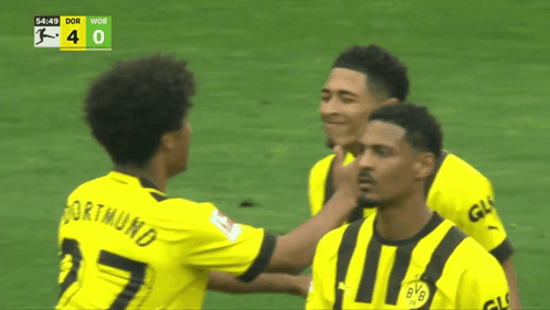 a soccer player with the name dortmund on the back of their jersey