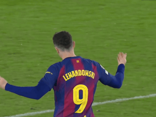 A Soccer Player With The Name Lewandowski And The Number 9 GIF