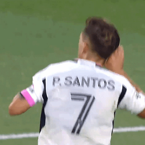 A Soccer Player With The Name P. Santos On His Shirt GIF
