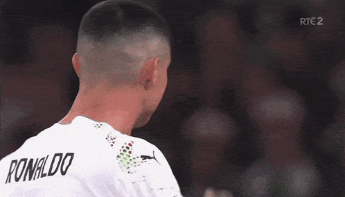 A Soccer Player With The Name Ronaldo On His Shirt GIF
