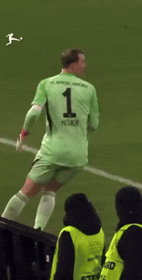 a soccer player with the number 1 on the back of his shirt
