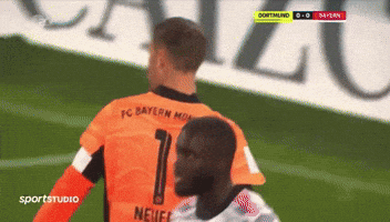 a soccer player with the number 1 on the back of his shirt
