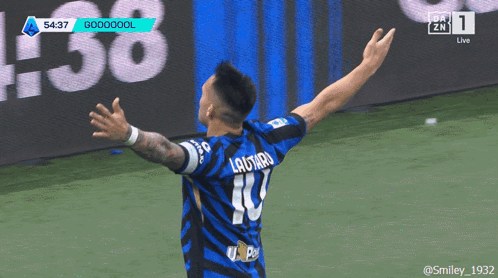 a soccer player with the number 10 on his jersey celebrates