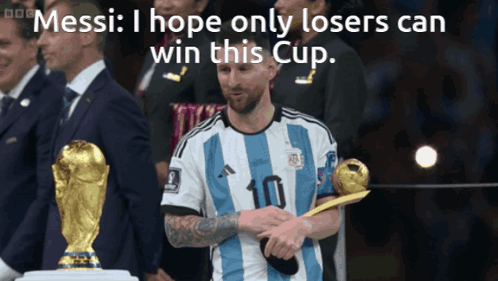 A Soccer Player With The Number 10 On His Jersey Holding A Trophy GIF