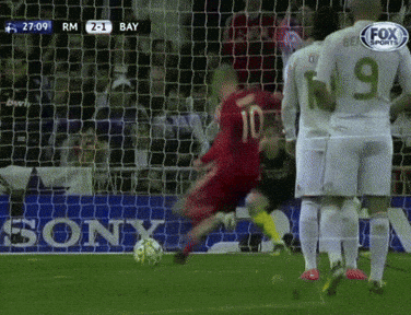 a soccer player with the number 10 on his jersey kicks the ball