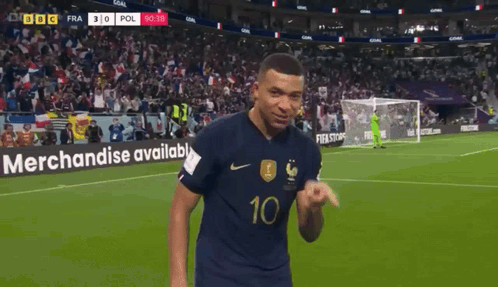 A Soccer Player With The Number 10 On His Jersey Stands On The Field GIF