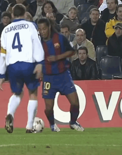 A Soccer Player With The Number 10 On His Shorts Kicks The Ball GIF