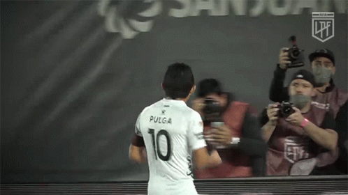 A Soccer Player With The Number 10 On The Back Of His Shirt GIF