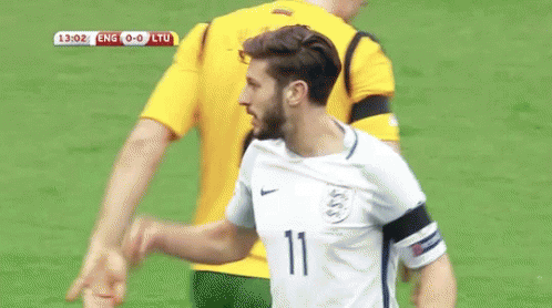 A Soccer Player With The Number 11 On His Jersey Is Scratching His Forehead GIF