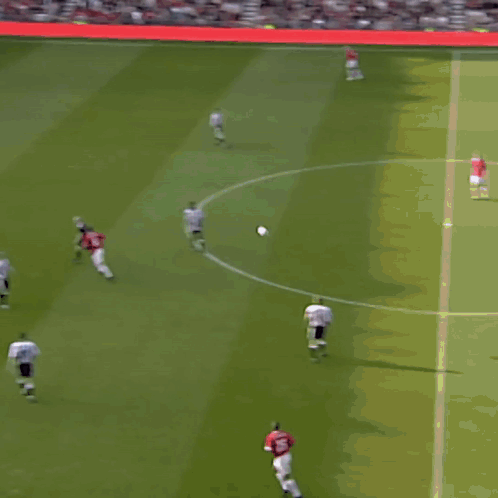 A Soccer Player With The Number 11 On His Jersey Stands On The Field GIF