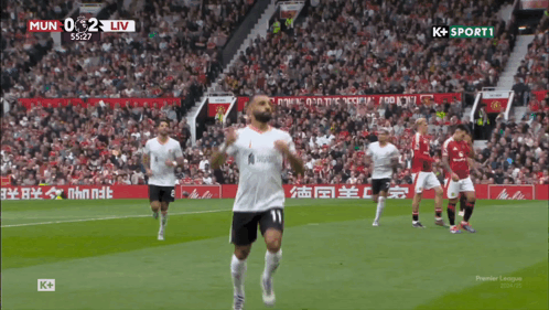 A Soccer Player With The Number 11 On His Shirt GIF