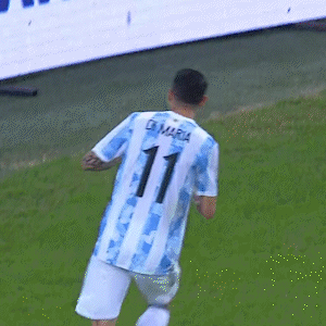 a soccer player with the number 11 on the back of his shirt