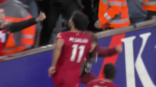 A Soccer Player With The Number 11 On The Back Of His Shirt GIF