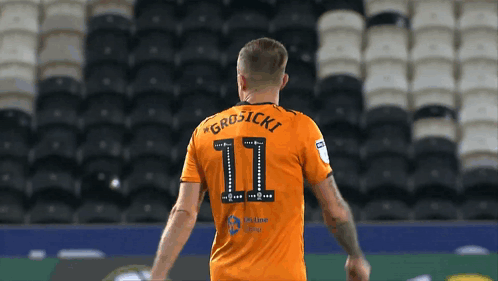 A Soccer Player With The Number 11 On The Back Of His Shirt GIF