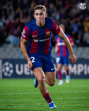 A Soccer Player With The Number 12 On His Jersey Is Running On The Field GIF