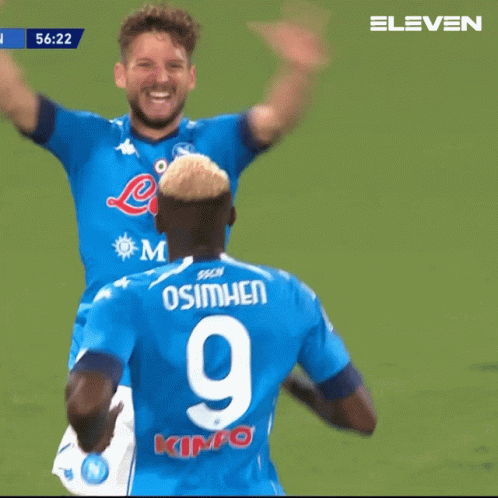 A Soccer Player With The Number 14 On His Back Is Hugging Another Player GIF