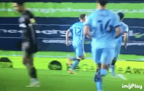 A Soccer Player With The Number 16 On His Back Is Running On The Field GIF