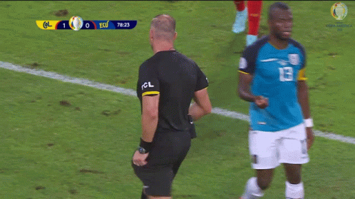 A Soccer Player With The Number 16 On His Jersey Talks To A Referee GIF