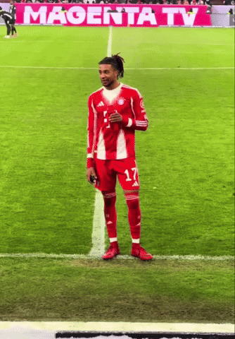 A Soccer Player With The Number 17 On His Jersey Stands On The Field GIF