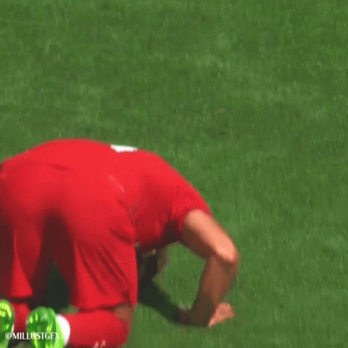 A Soccer Player With The Number 18 On His Shirt Is Talking To Another Player GIF