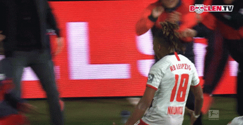 A Soccer Player With The Number 18 On Their Jersey GIF