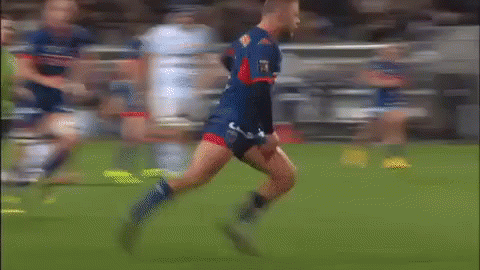 A Soccer Player With The Number 2 On His Jersey Is Running On The Field GIF