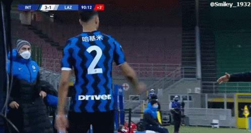 a soccer player with the number 2 on his shirt