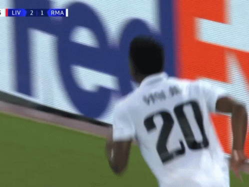 a soccer player with the number 20 on his shirt