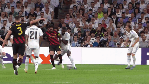 A Soccer Player With The Number 21 On His Back GIF