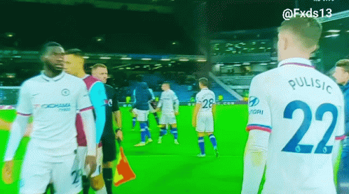 a soccer player with the number 22 on their back
