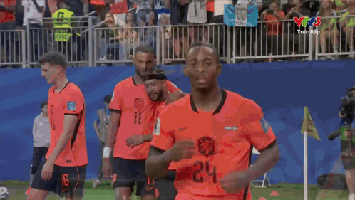 A Soccer Player With The Number 24 On His Jersey Is Running On The Field GIF