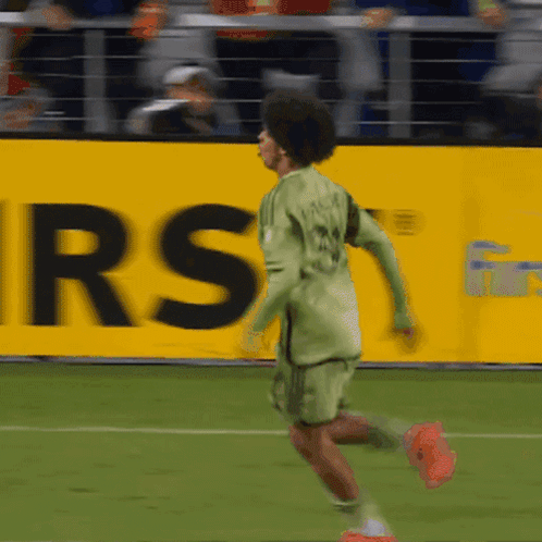 A Soccer Player With The Number 24 On His Jersey Is Running On The Field GIF