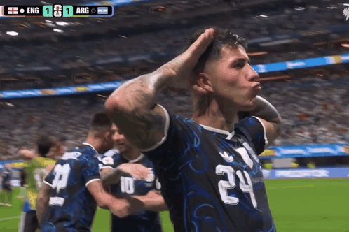 A Soccer Player With The Number 24 On His Jersey Stands On The Field GIF