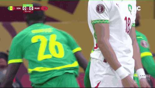 a soccer player with the number 26 on his shirt
