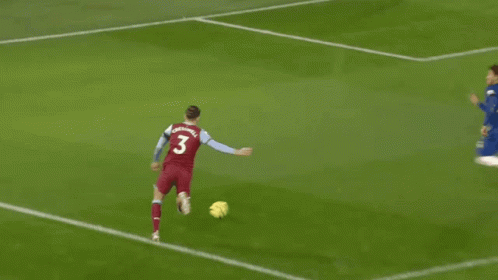 A Soccer Player With The Number 29 On His Jersey Kicks The Ball GIF