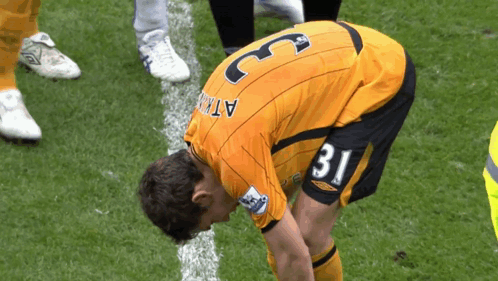 A Soccer Player With The Number 31 On His Shorts Looks Down GIF