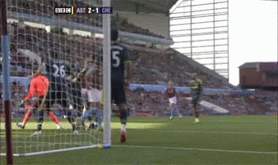 A Soccer Player With The Number 5 On His Jersey Runs Towards The Goal GIF