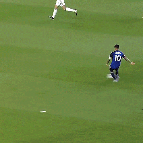 A Soccer Player With The Number 51 On His Back Is Kicking The Ball GIF