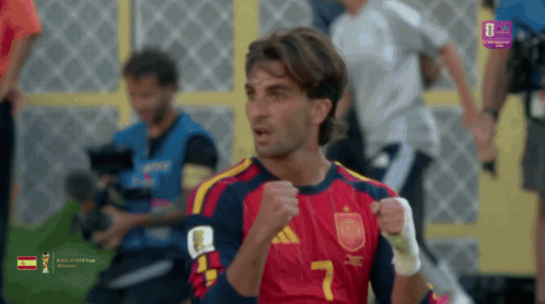 A Soccer Player With The Number 7 On His Jersey Is Celebrating GIF