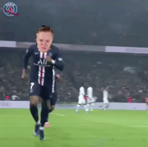 A Soccer Player With The Number 7 On His Jersey Is Running On A Field . GIF